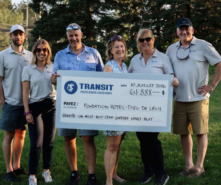 Six people stand outdoors holding an oversized check for $61,888 made out to Fondation Hôtel-Dieu de Lévis, dated July 10, 2026.
